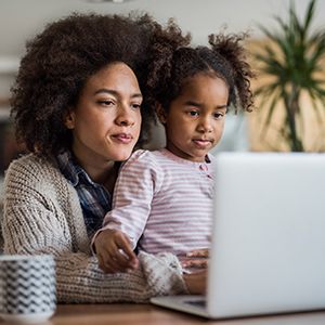 Image of Mother and Child accessing virtual visit