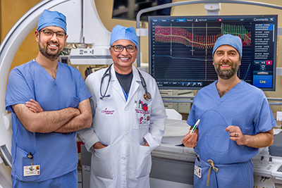 Doctor
Al Jayyousi, Dr Sharma and Dr
Zaitoun with the Coroventis CoroFlow Cardiovascular System and Abbott's PressureWire
