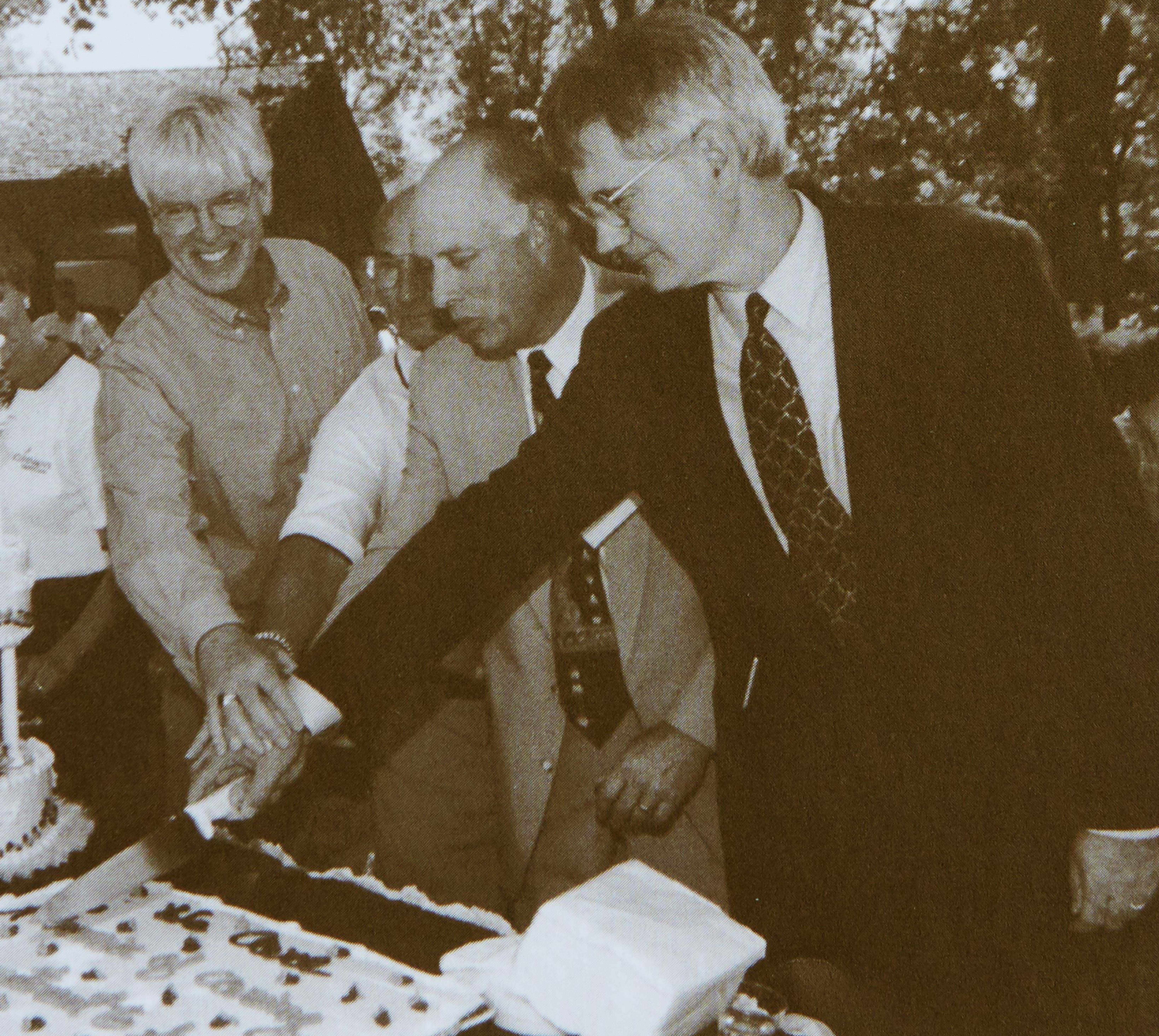 Leaders from St. Luke's and Saginaw General cut Covenant birthday cake